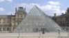 An empty Louvre Museum - but art buffs can still visit the most popular masterpieces online. (Lisa Bryant/VOA)