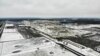 FILE - Snow covers the perimeter of the General Motors' Lordstown plant, in Lordstown, Ohio, Nov. 28, 2018. 