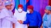 Shugaba Buhari da wasu daga cikin sanatoci yayin da suka yi wata ganawa