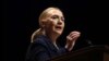 Secretary of State Hillary Rodham Clinton gestures as she gives a speech at Dublin City University in Dublin, Ireland, December 6, 2012.