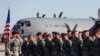 FILE - Members of the U.S. Army 173rd Airborne Brigade attend a welcome ceremony upon their arrival at a Lithuanian air force base in Siauliai, Lithuania, April 26, 2014. Troops from the brigade will be among those participating in exercises Rapid Trident