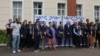 Members of the EU observer mission team pose for a group photo before their deployment Thursday in Blantyre.