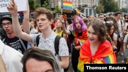 Participants take part at the Equality March, organized by the LGBT community in Kyiv, June 23, 2019.
