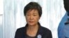 FILE - Former South Korean President Park Geun-hye arrives to attend a hearing on the extension of her detention at the Seoul Central District Court in Seoul, South Korea on Oct. 10, 2017.