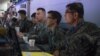FILE - A US Army sergeant works on battle plans alongside Republic of Korea air force officers, March 10, 2015, during an exercise at South Korea's Osan Air Base. (US Air Force photo)
