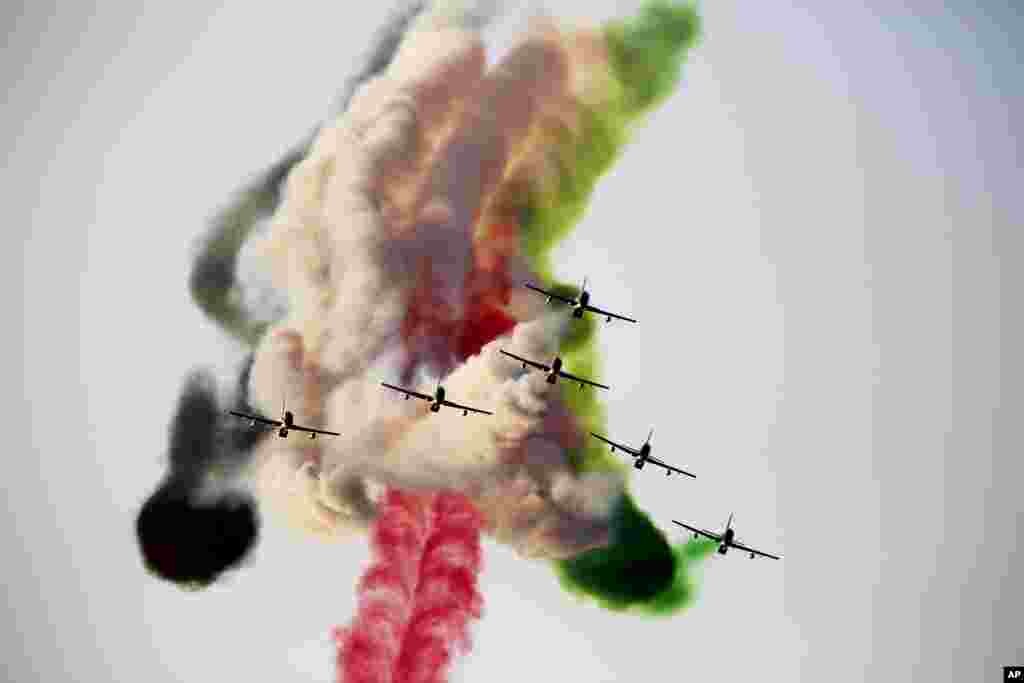 The Al Fursan aerobatic team of the United Arab Emirates' air force performs a stunt at the World Air Games in Dubai.