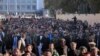 Supporters of Afghanistan's leading presidential candidate, Abdullah Abdullah, march during a mass demonstration in Kabul, Afghanistan, Nov. 29, 2019.