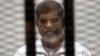 Former Egyptian President Morsi Buried Day After Dying in Court