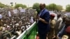 Sudanese President Omar Hassan al-Bashir addresses a crowd during a campaign rally in East Darfur, April 5, 2016. 