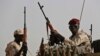 FILE - Sudanese Rapid Support Forces soldiers in the East Nile province, Sudan, on June 22, 2019. 