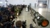 FILE - Foreign military attaches and journalists attend a briefing by the Russian Defense Ministry about the 9M729 land-based cruise missile, right, in Kubinka, Russia, Jan. 23, 2019. 