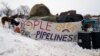 Hay is stacked up to feed horses at a protest encampment along the route of the Dakota Access oil pipeline near Cannon Ball in southern North Dakota, Jan. 24, 2017. 
