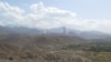 FILE - Smokes rises after U.S airstrike hit the site of insurgent activity in Nangarhar province, Afghanistan, July 7, 2018. 