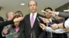 U.S. Ambassador to Japan John Roos (C) delivers a statement after a meeting with Japan's Senior Vice Foreign Minister Shuji Kira (not in picture) at the Foreign Ministry in Tokyo, in this photo by Kyodo October 17, 2012. 