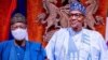 Shugaba Buhari (dama), Lai Mohammed (hagu) (Facebook/Fed. Min. of Information)