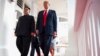 North Korea leader Kim Jong Un and U.S. President Donald Trump walk along the balconies at the Capella resort on Sentosa Island, June 12, 2018 in Singapore.