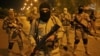 A still image taken from an Islamic State video released through the group's Amaq news agency shows an unidentified militant addressing the camera, reportedly in Mosul, Iraq, on Oct. 18, 2016. 