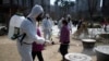 Members of a local residents group wear protective gear as they disinfect a local park as a precaution against the new coronavirus in Seoul, South Korea, Monday, March 23, 2020. For most people, the new coronavirus causes only mild or moderate…