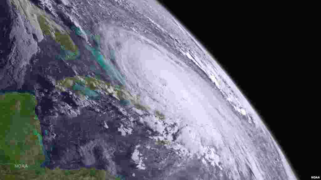 Major Hurricane Joaquin is shown at the far eastern periphery of the GOES West satellite's full disk extent.