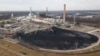 A large field of coal is stored on the property of Dominon Energy's Chesterfield Power station in Chester, Virginia., Dec. 4, 2017. The station is a coal fired power station along the James River. 