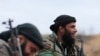 Rights Groups Allege Syrian Rebel Leader Arrested in France Committed War Crimes