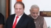 Pakistan's Prime Minister Nawaz Sharif (L) arrives for his bilateral meeting with his Indian counterpart Narendra Modi in New Delhi, May 27, 2014.
