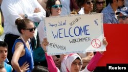 Le public à Berlin lors du discours du président américain Barack Obama