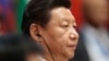 FILE - Chinese President Xi Jinping listens during the BRICS summit in Ufa, Russia, July 9, 2015.