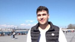 Student Muhammet says the threat of COVID-19 is real, and precautions should be taken. (Dorian Jones/VOA)
