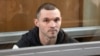 FILE - U.S. Army Staff Sgt. Gordon Black sits in a glass cage in courtroom in Vladivostok, Russia, June 6, 2024. U.S. soldier Gordon Black is on trial in Vladivostok on charges of theft and threatening murder in a dispute with a Russian woman.