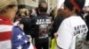 FILE - Iraqis and supporters rally outside the Theodore Levin United States Courthouse in Detroit, June 21, 2017.