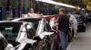 Tentative GM Contract Hikes Pay; Plant Closures to Proceed