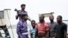 Suspected pirates are paraded aboard a naval ship after their arrest by the Nigerian Navy at a defense jetty in Lagos, August 20, 2013. 