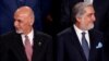 FILE - Afghanistan's President Ashraf Ghani (L) and Afghanistan's Chief Executive Abdullah Abdullah (R) attend the NATO Summit in Warsaw, Poland July 8, 2016.