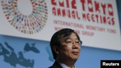 People's Bank of China Deputy Governor Yi Gang is seen at the IMF/World Bank Group meeting in Tokyo October 14, 2012. 