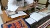 FILE - Judge Mufti Abdul Qayyum listens during the hearing of a divorce case at a Darul Qaza or Islamic Court in Ahmadabad, India.