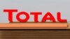 The logo of French oil giant Total is pictured at a petrol station in Laplume, France, Jan. 16, 2020. 