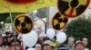 Anti-nuclear demonstrators gather outside Japanese Prime Minister Yoshihiko Noda's official residence in Tokyo, August 10, 2012.