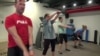 Exercisers at the Roam Fitness gym in downtown Washington