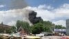 Smokes rises from a hospital after gunmen attacked in Kabul, Afghanistan, May 12, 2020. 