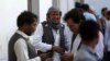 Afghans mourn a victim of a deadly suicide bombing that targeted a training class in a private building in the Shiite neighborhood of Dasht-i Barcha, in western Kabul, Afghanistan, Aug. 15, 2018. On Thursday, there was a new attack on the Afghan intelligence service in Kabul.