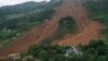 中国贵州省六盘水市水城县鸡场镇坪地村岔沟组2019年7月24日发生山体滑坡，图片中可以看到救援人员和帐篷。