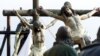 FILE - A scene depicting the crucifiction of Christ