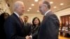Vice President Joe Biden shakes hands with Rotterdam Mayor Ahmed Aboutaleb ahead of a summit on countering violent extremism in Washington, Feb. 17, 2015.