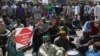 Supporters of the Tehreek-e-Labaik Pakistan (TLP), a hardline religious political party, protest against the court decision to overturn the conviction of Christian woman Asia Bibi in Karachi, Oct. 31, 2018. 