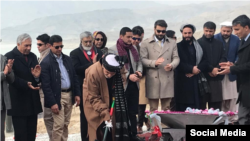Afghan President Ashraf Ghani is seen laying the foundation stone for the future CASA-1000 transmission line at the groundbreaking site, east of the capital, Kabul, in a photo published Feb. 6, 2020, on his Twitter feed.