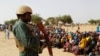 FILE - A soldier stands in guard at the Boudouri site for displaced persons outside the town of Diffa, in southeastern Niger, June 18, 2016. 