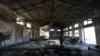 FILE - A closed brick factory building on the outskirts of Beijing, China, Jan. 18, 2016. Chinese manufacturing ebbed in January to its lowest in more than three years, a possible sign of further weakness in the world's No. 2 economy.