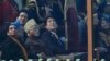 Japanese Prime Minister Shinzo Abe, center, watches Indian fighter planes flying past as the chief guest at the Indian Republic Day parade in New Delhi, India, Jan. 26, 2014. 