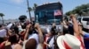 Demonstrators block a bus with migrant children onboard, during a protest outside the U.S. Border Patrol Central Processing Center, in McAllen, Texas, June 23, 2018.